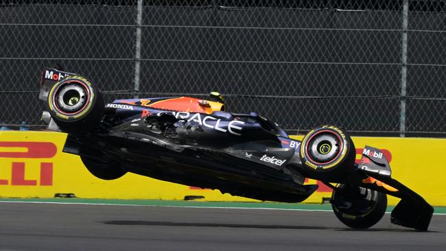 Perez went airborn after being clipped on the opening turn. Picture: AFP