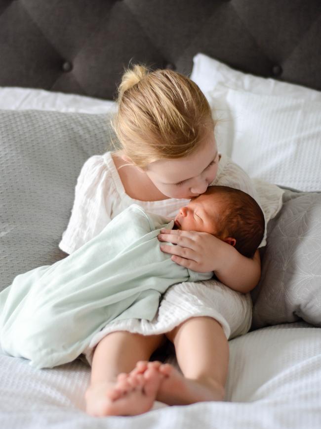 Lola Chesters holding baby brother Lawrence. Picture: Supplied