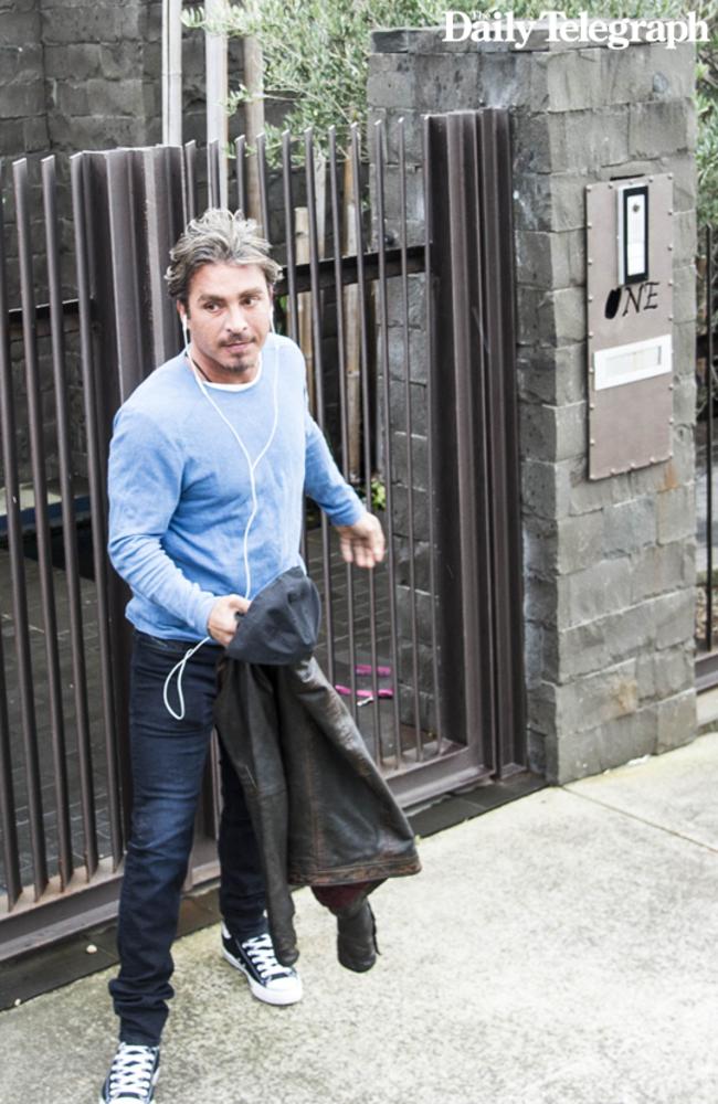 John Ibrahim exits his home — alone. The first time he’s been seen since the arrest of several family members. Picture: Darren Leigh Roberts