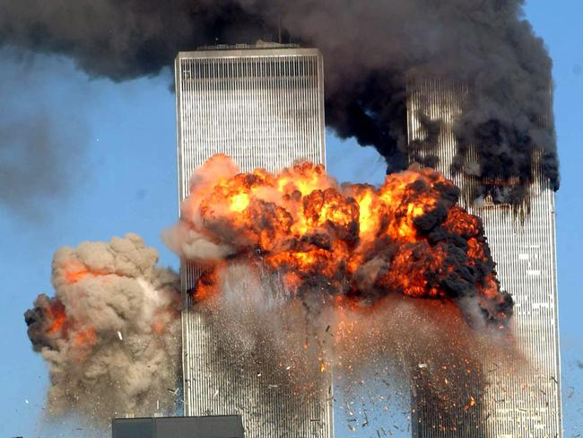 A fiery blasts rocks the south tower of the World Trade Centre. Picture: Getty Images