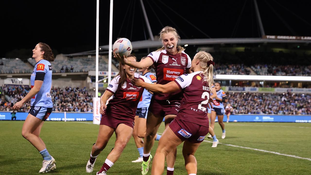 Tarryn Aiken celebrates with teammates after scoring a try against NSW at GIO Stadium on June 24, 2022 in Canberra, Australia. Photo: Getty Images