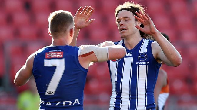 Ben Brown and Jack Ziebell celebrate a goal in the Kangaroos’ win.