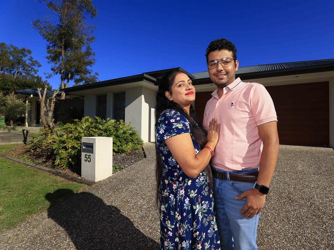 Investor Arvinder Singh and  Aman GABA have gone into the investment market to get ahead for their family. Seen with their Yarrabilba property.
