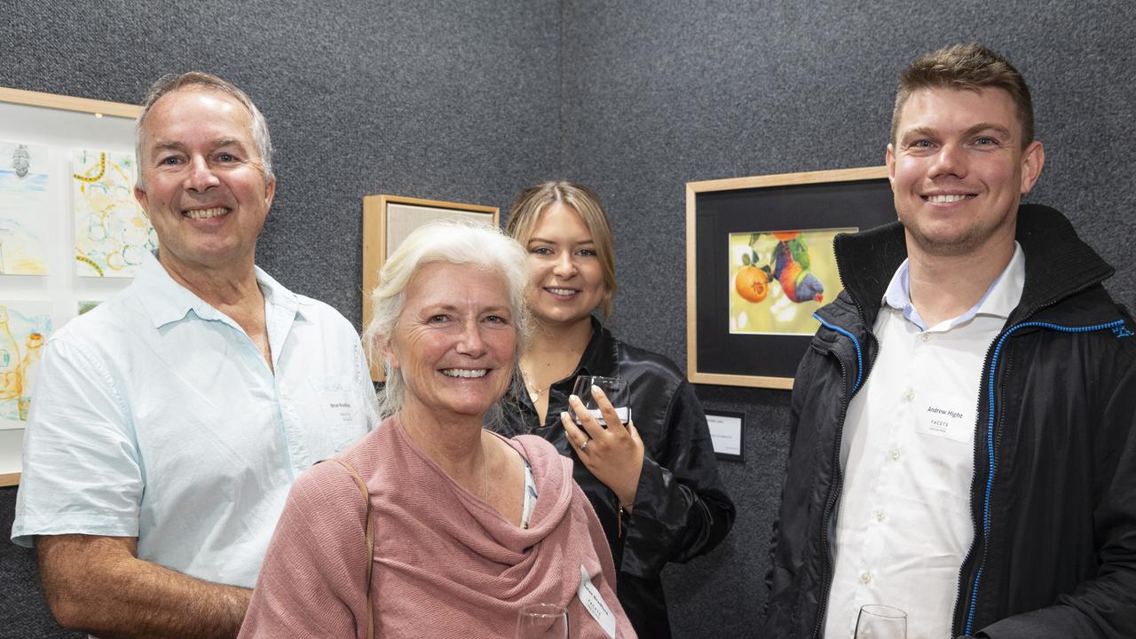 Exhibited artist Juliet Bradford (front) shows her work Cheeky to family (from left) Brian Bradford, Sarah Bradford and Andrew Hight in the Fairholme Open Art Prize FACETS exhibition, Friday, May 10, 2024. Picture: Kevin Farmer