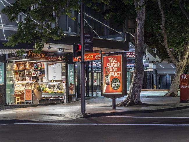 A very quiet Kings Cross this morning at Darlinghurst and Bayswater roads in 2018. Picture: Gordon McComiskie