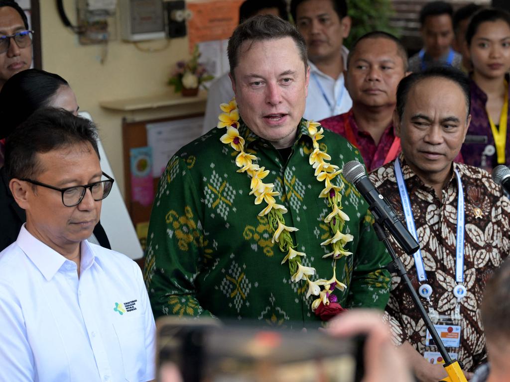 Tech billionaire Elon Musk speaks next to Indonesia's Health Minister Budi Gunadi Sadikin (left) during a ceremony held to inaugurate the satellite unit Starlink at a community health centre in Denpasar on Indonesia's resort island of Bali. Picture: Sonny Tumbelaka/AFP