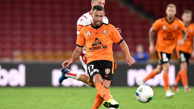 Scott McDonald on the ball against Adelaide United at Suncorp Stadium.