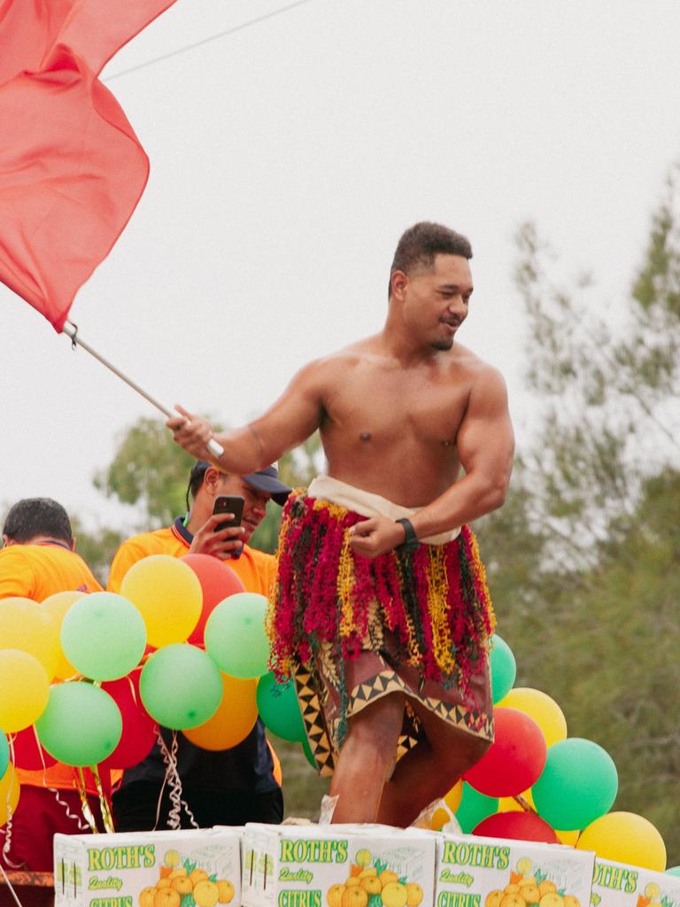 A brave float rider at the 2023 Gayndah Orange Festival.