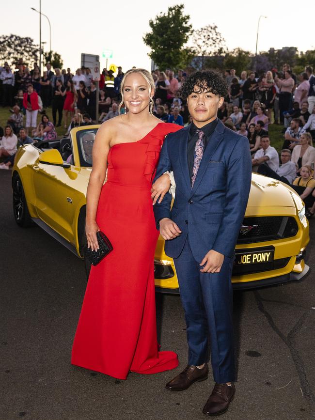 Bella Fraser and Yuri Decampo arrive at Harristown State High School formal at Highfields Cultural Centre, Friday, November 18, 2022. Picture: Kevin Farmer