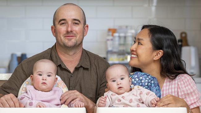 Testicular cancer survivor Jordan Shaddock with his partner Julie and twins Josephine and Frankie (8months). Picture: Jake Nowakowski