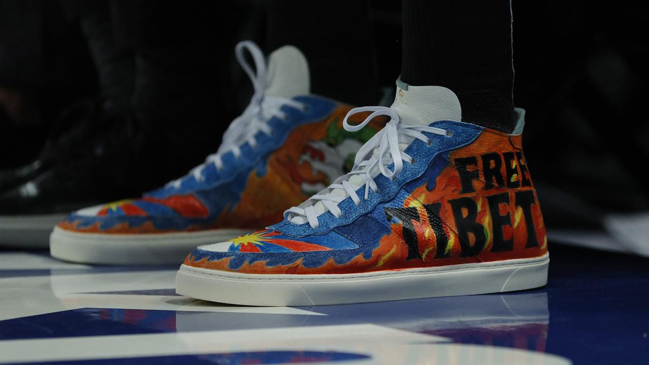 NEW YORK, NEW YORK - OCTOBER 20: Detail of the shoes worn by Enes Kanter #13 of the Boston Celtics with the wording "Free Tibet" during the first half against the New York Knicks at Madison Square Garden on October 20, 2021 in New York City. NOTE TO USER: User expressly acknowledges and agrees that, by downloading and or using this photograph, User is consenting to the terms and conditions of the Getty Images License Agreement. Sarah Stier/Getty Images/AFP == FOR NEWSPAPERS, INTERNET, TELCOS &amp; TELEVISION USE ONLY ==