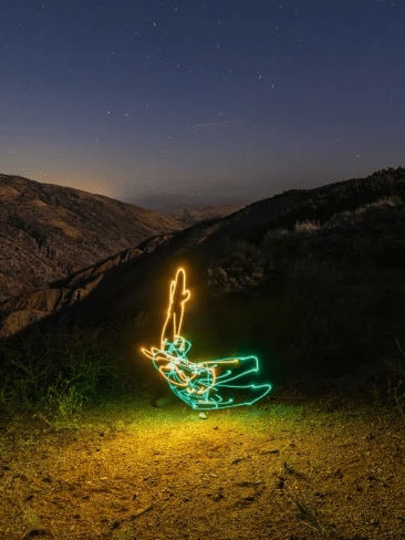 An American photographer has captured controversial Australian break dancer Racheal ‘Raygun’ Gunn in a unique tribute using light, long exposure and the Californian night sky. Picture: Instagram