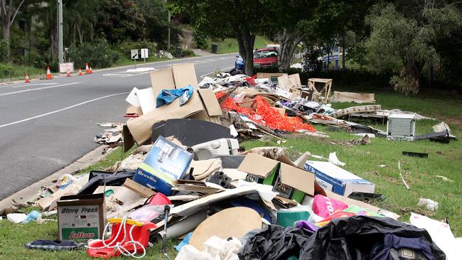 Rubbish piled up and awaiting collection on a road at Elanora.