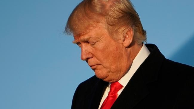 US President Donald Trump steps off air force One upon return to Andrews air force in Maryland. Picture: AFP