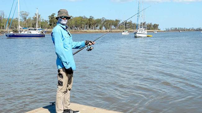 Mark Jenkins from Norman Gardens fishes for blue and king salmon off the southside boat ramp. Picture: Jann Houley