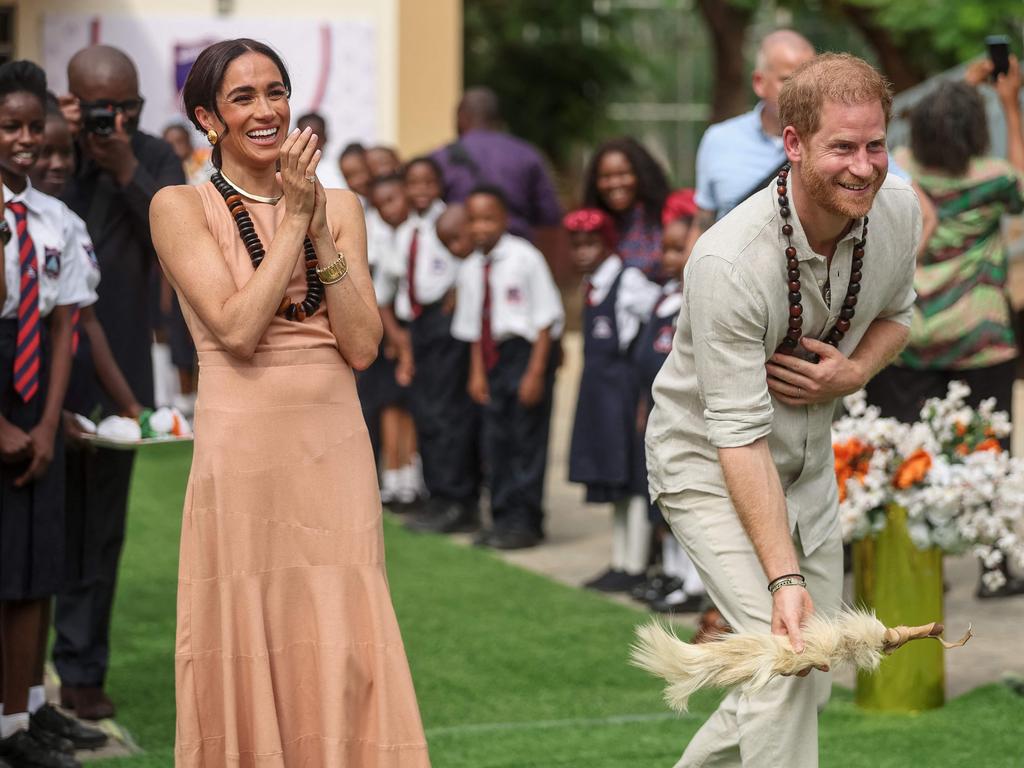 Meghan Markle and Prince Harry charmed the people of Nigeria in a faux royal trip. Picture: AFP