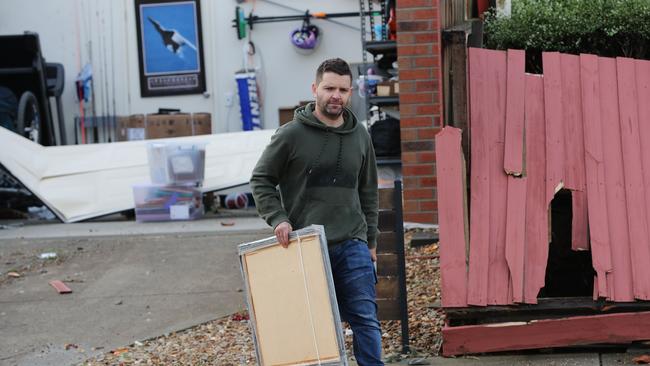 Ben Geer clears his belongings from his garage. Picture: Peter Ristevski