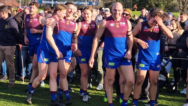 Banyule players celebrate after the siren. Picture: Ben Higgins