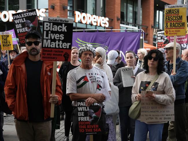 People take part in an anti-racism counter protest at Piccadilly Gardens on August 3. Picture: Getty Images