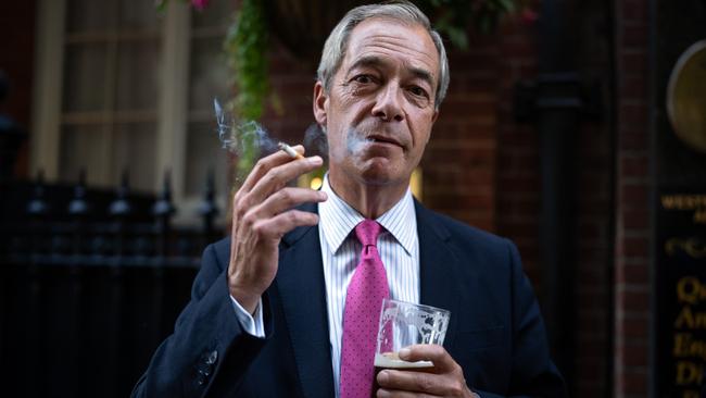 Nigel Farage says he will never go to a pub again if outside smoking is banned. Picture: Getty Images