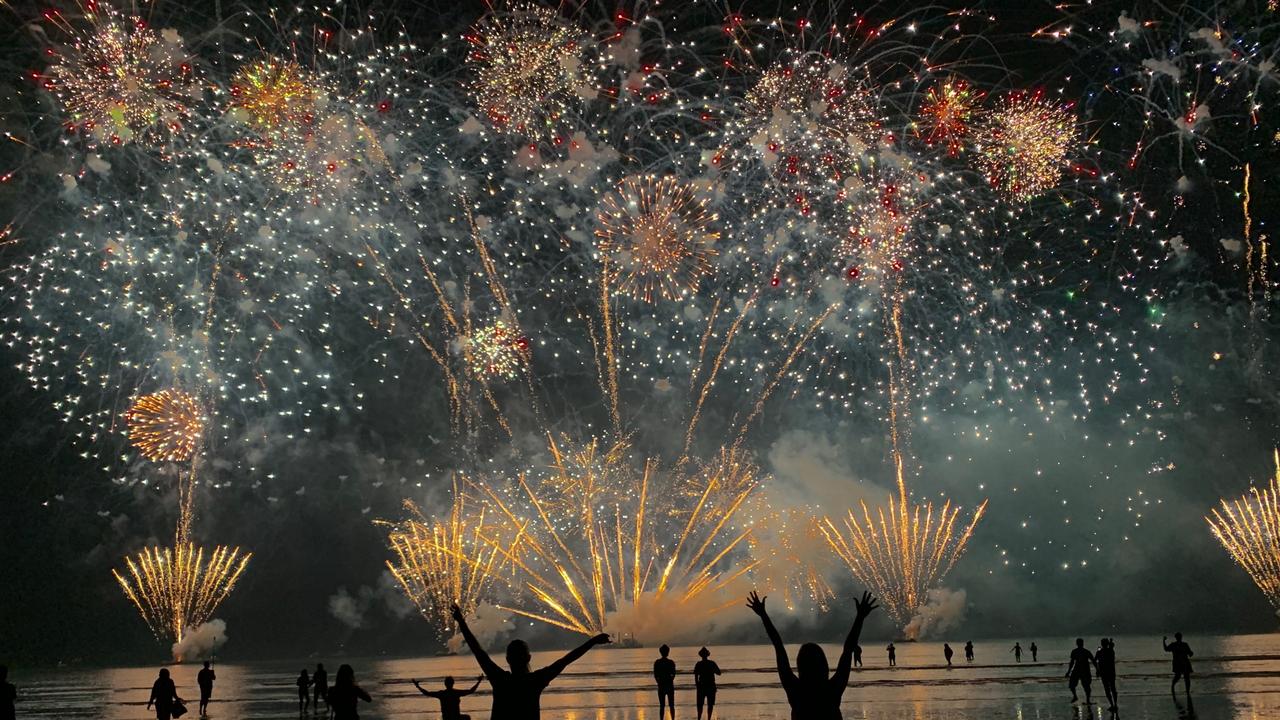 Lily North and Katrina Leembruggen enjoy the Fireworks at Mindil Beach Picture: Supplied Territory Day 2019 Fireworks Gallery