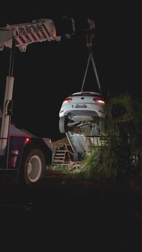 Car lifted from the roof of Kenmore home