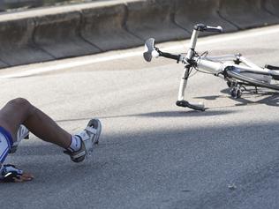 Israel's Shani Bloch crashes during the women's road race over 127.4 kilometers (79.2 miles) of the Road Cycling World Championships in Ponferrada, north-western Spain, Saturday Sept. 27, 2014. (AP Photo/Graham Watson, Pool)