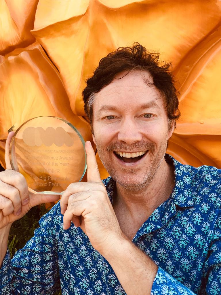 Delighter Big Pineapple Music Festival promoter Mark Pico with the Queensland Music Awards Peoples Choice Festival of the Year Award the event has won for the second successive year.