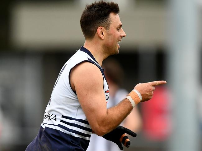 Sam Lloyd of Bundoora celebrates kicking a goal  during the round 13 Northern Football Netball League 2023 Melbourne Greyhounds Division 1 Seniors match between Bundoora and Montmorency at Yulong Reserve in Bundoora, Victoria on July 15, 2023. (Photo by Josh Chadwick)