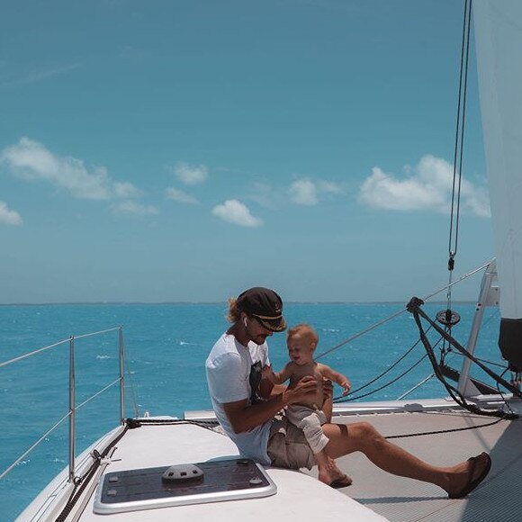 Riley Whitelum with son Lenny on their boat. Picture: Instagram