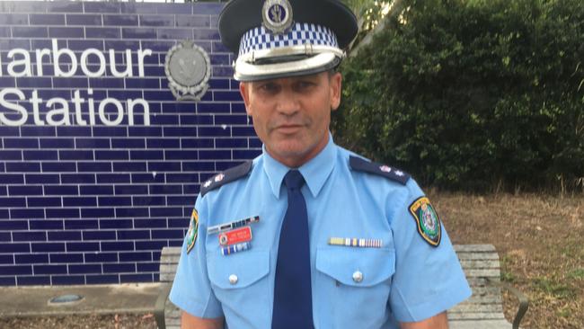 Acting Superintendent Matthew French speaking outside Coffs Harbour Police station. Picture: Chris Knight