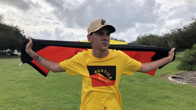 Dylan Voller, whose treatment at the hands of guards at Don Dale Youth Detention Centre sparked a royal commission, was among a small group of indigenous activists that held up the Queen’s Baton Relay on the Gold Coast today. Supplied