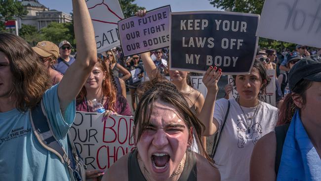 Activists from opposing sides of the abortion debate face off in front of the Supreme Court in Washington,. Picture: AFP