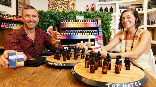 Rare Earth Oils uses all natural ingredients to make ointments, balms and now perfumes. Rare Earth Oils chief forager Rahm Adamedes and chief imagineer Meleuka Morton-Masterman with some of the products they sell from their shop in Kuranda Village. Picture: Brendan Radke