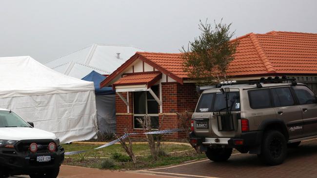 Forensic services attend the scene where three people were found dead in Ellenbrook, Perth. Picture: AAP/Trevor Collens