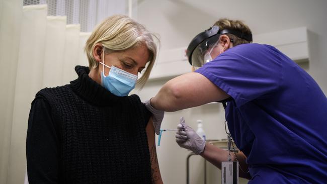 A healthcare worker receives the first of two doses of the Pfizer-BioNtech COVID-19 vaccine at a hospital in Gothenburg. Sweden has decided to recommend against vaccinating five to 11-year-olds for Covid-19. Picture: Fredrik Lerneryd/Getty Images