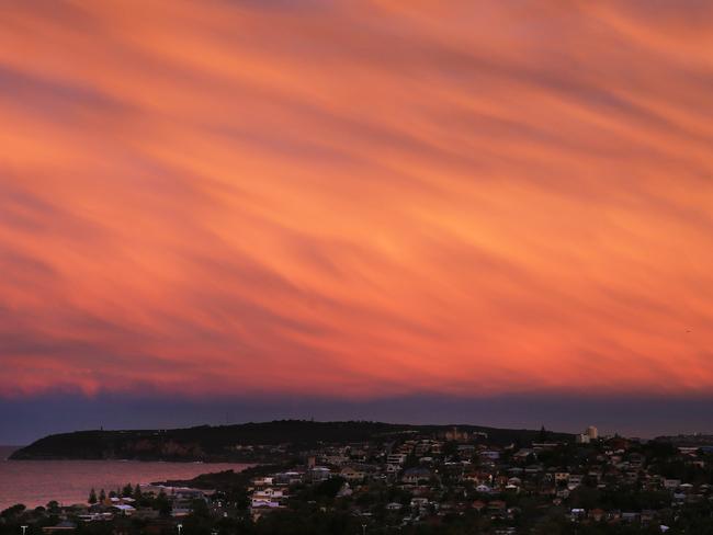 Sydney’s stunning winter sunset lights up the city | Daily Telegraph
