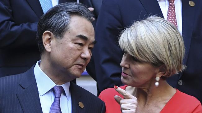 Wang Yi and Julie Bishop in Buenos Aires yesterday. Picture: AFP