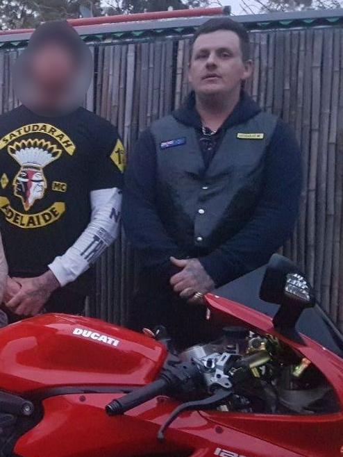 David Michael Evans (right), pictured in Satudarah outlaw bikie gang regalia, has pleaded not guilty to allegations he took part in a standover job of Chris Sanchez.