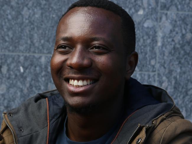 QLD_QWEEKEND_HARDKNOCKS Feature on how uni scholarships have changed lives. Ezekiel Nimbaye fled Burundi as a five year old without any family, grew up in a refugee camp, came to Australia in 2009, won a QUT scholarship and is now in his final year of a Bachelor of Engineering degree. Photo David Kelly