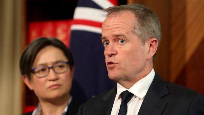 Opposition Leader Bill Shorten with Penny Wong after their meeting with Malcolm Turnbull yesterday in Melbourne. Picture: Stuart McEvoy