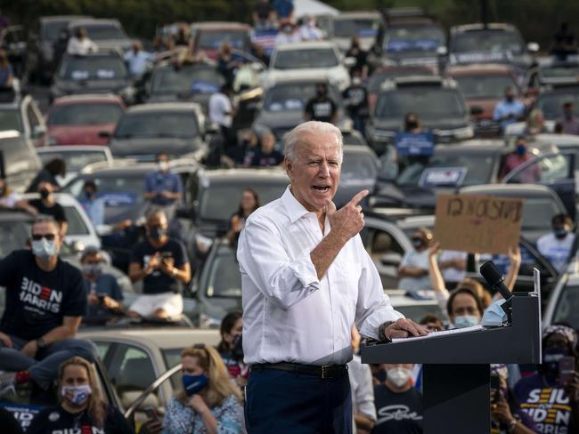 ATLANTA, GA - OCTOBER 27: Democratic presidential nominee Joe Biden speaks during a drive-in campaign rally in the parking lot of Cellairis Ampitheatre on October 27, 2020 in Atlanta, Georgia. Biden is campaigning in Georgia on Tuesday, with scheduled stops in Atlanta and Warm Springs.   Drew Angerer/Getty Images/AFP == FOR NEWSPAPERS, INTERNET, TELCOS & TELEVISION USE ONLY ==