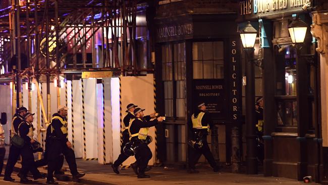 Armed police raid the pub The Blue Eyed Maid in Borough High Street. Picture: Getty Images