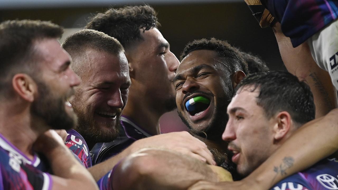 The Cowboys celebrate after winning against the Tigers. Picture: Ian Hitchcock/Getty