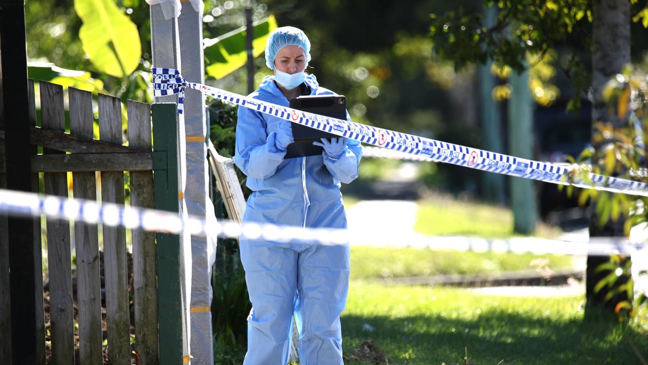Police at the home at Inala where a man was wounded. Picture: David Clark