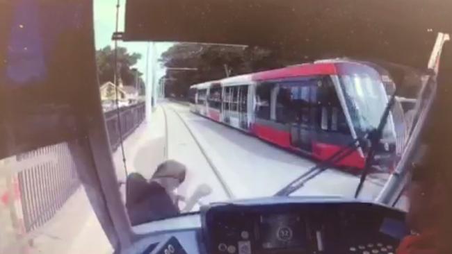 CCTV of a boy being hit by Sydney's new light rail in Moore Park today.