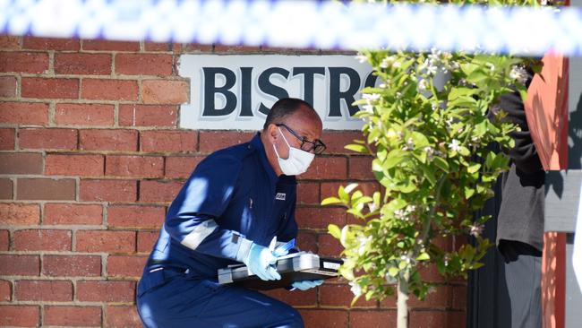 Police on Sunday investigating outside the Farmers Arms Hotel. Picture: Andrew Henshaw