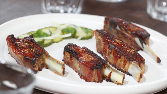 Char sui lamb ribs with pickled cucumber. Photo by Richard Gosling