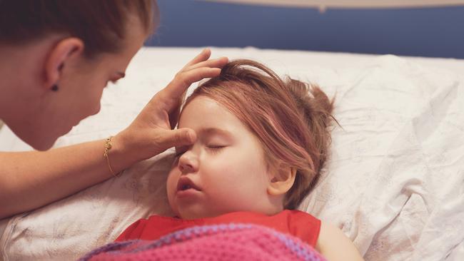 Tania Skarratts with her little girl Paige, who is continuing her brave battle with brain cancer at Brisbane’s Lady Cilento Children’s Hospital.