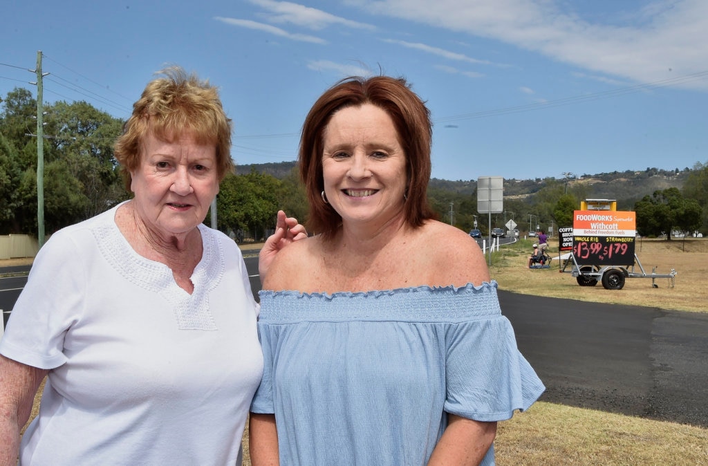 Judy Prenzler and her daughter Robyn Prenzler-Wilson ready to watch the convoy. One of the trucks carried a banner for Errol Prenzler husband and father who died 30 years ago. Lights on the Hill convoy leaves Withcott heading to Gatton. September 2017. Picture: Bev Lacey